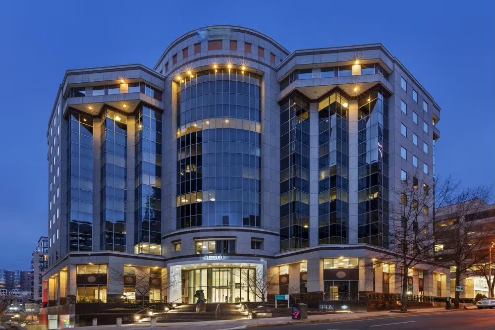Faucona & Co Arlington office at 1530 Wilson Boulevard, Arlington, Virginia, in the Rosslyn district at dusk